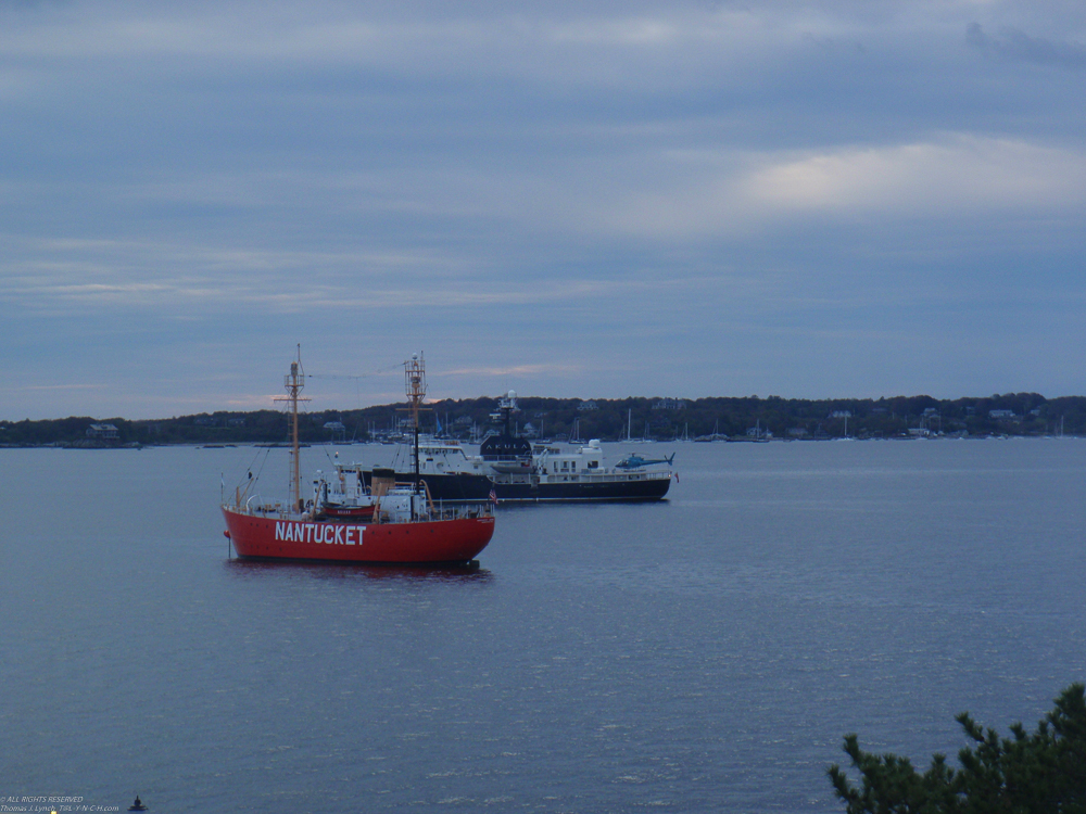 Akula (another) is in the back ground  ~~  Famous Nantuket light boat in the forground