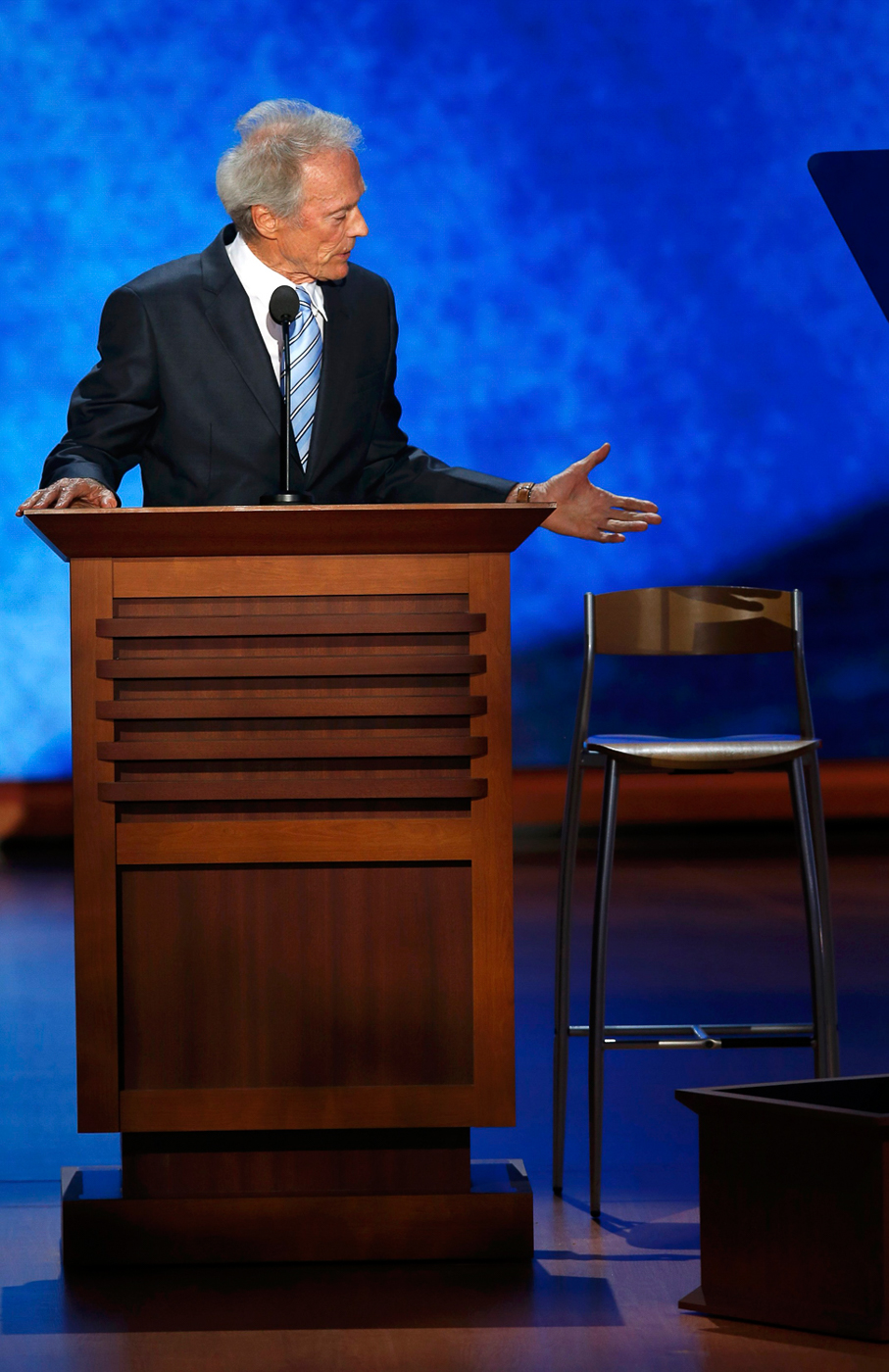 USA-CAMPAIGN/  ~~  Actor Clint Eastwood addresses an empty chair and questions it as if it were President Barack Obama as he endorses Republican presidential nominee Mitt Romney during the final session of the Republican National Convention in Tampa, Florida, August 30, 2012.